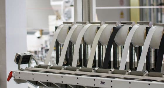 Machinery along a production line inside a manufacturing facility